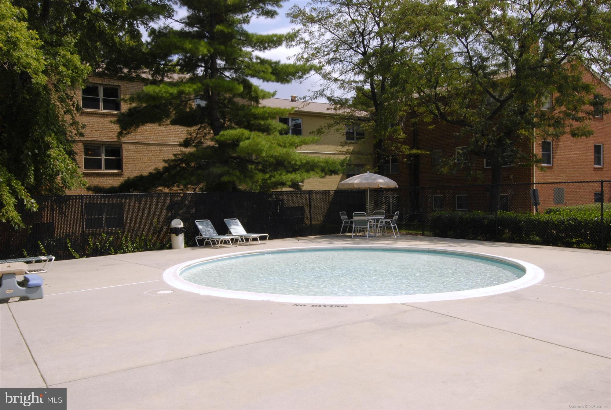 5909 Quantrell Avenue, Unit 203 Alexandria, VA 22312 - Photo 26 of 33 a view of a fountain in the middle of a building