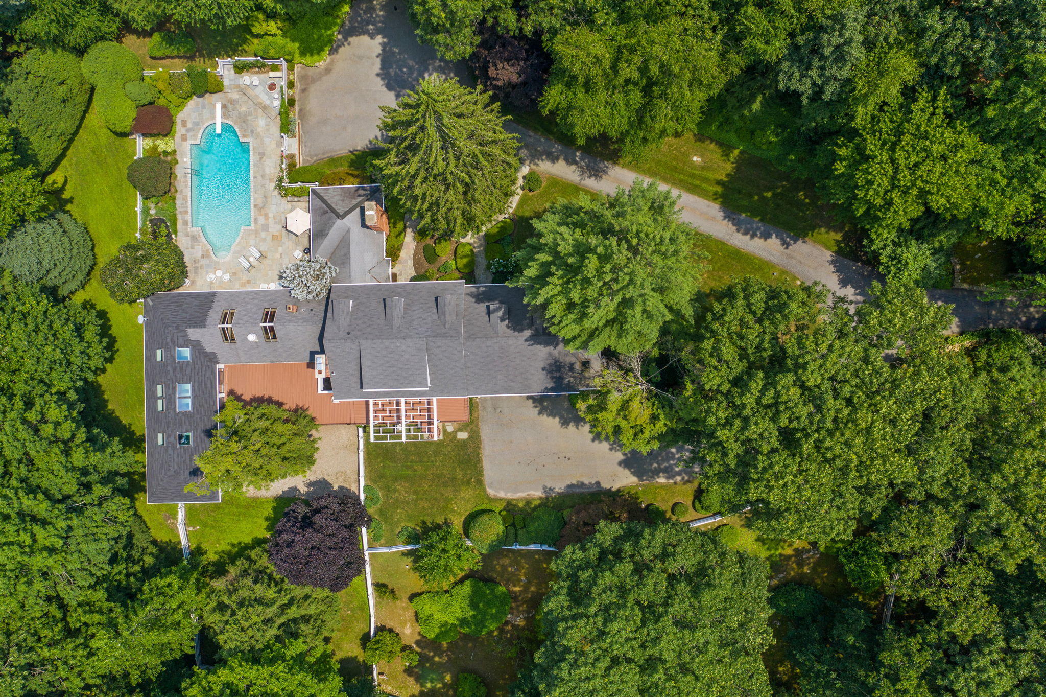 2061 Ponus Ridge Road New Canaan, CT 06840 - Photo 37 of 50 an aerial view of a house with a yard and lake view