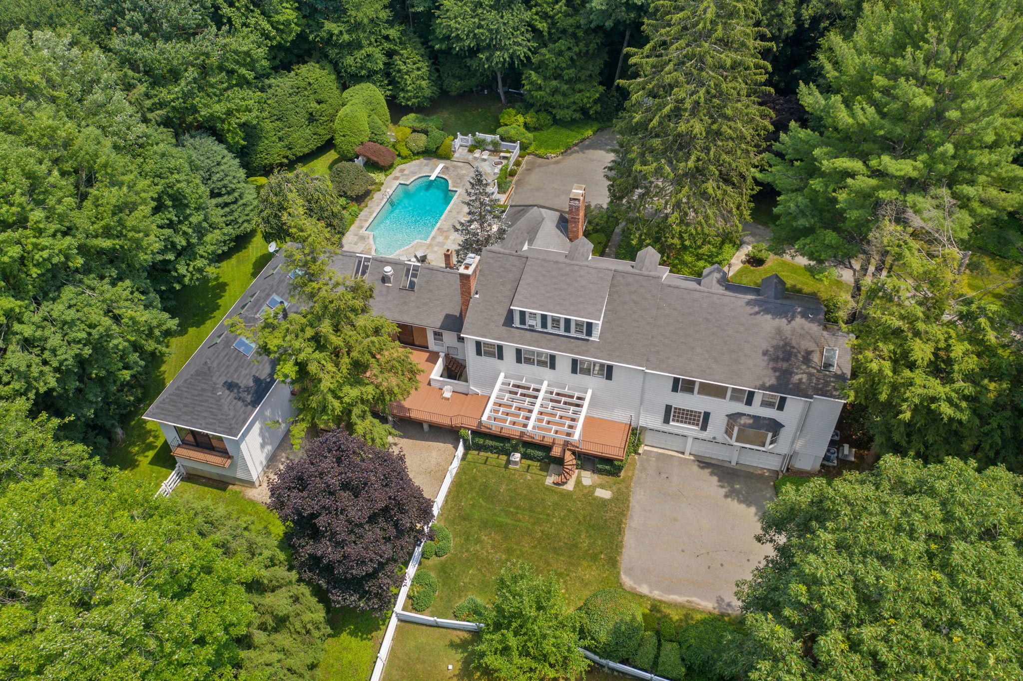 2061 Ponus Ridge Road New Canaan, CT 06840 - Photo 41 of 50 an aerial view of a house with a garden