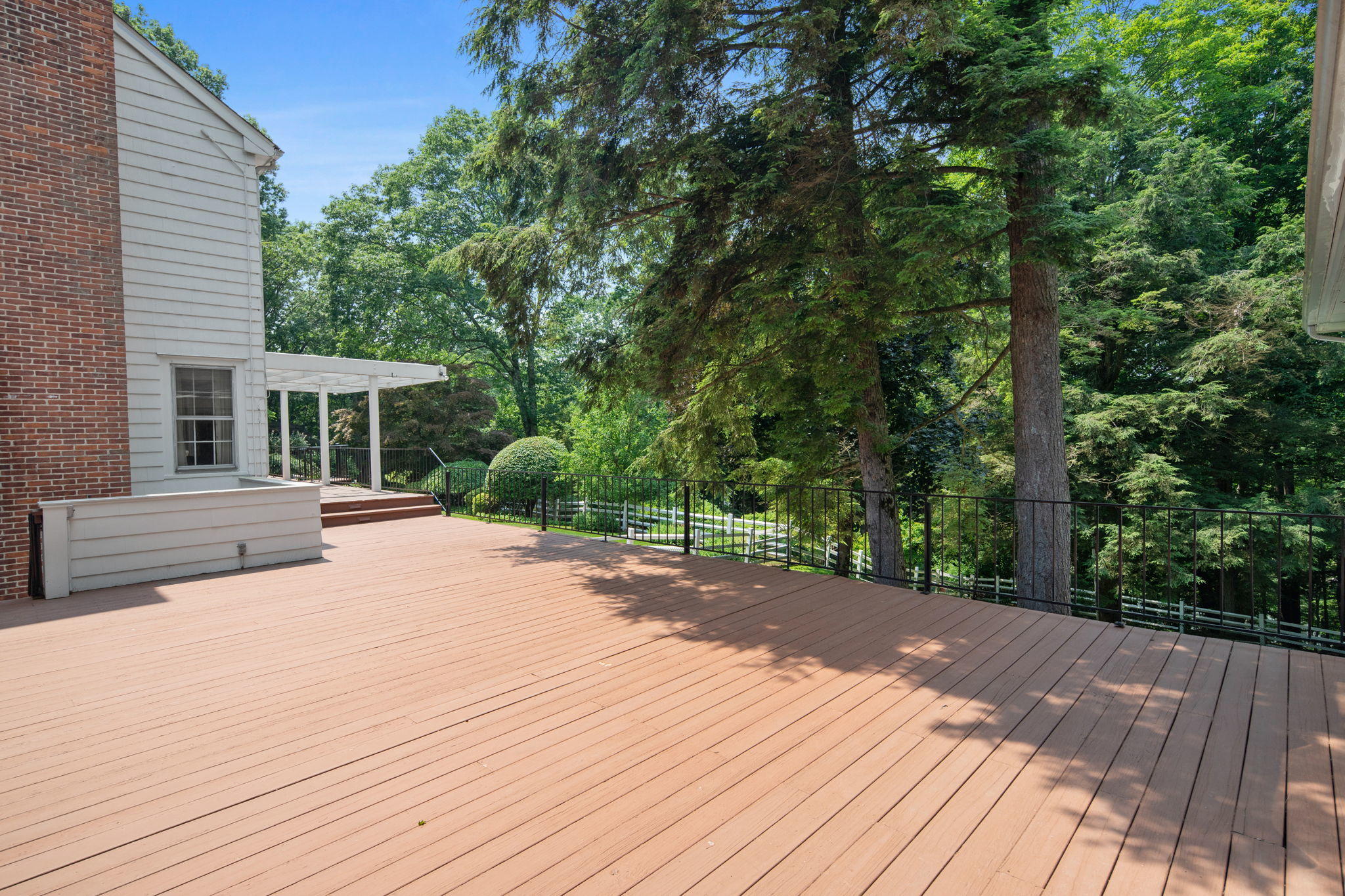 2061 Ponus Ridge Road New Canaan, CT 06840 - Photo 9 of 50 a house view with a wooden floor space