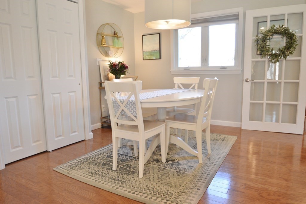 24 Raleigh Road Framingham, MA 01701 - Photo 16 of 37 a dining room with furniture and wooden floor