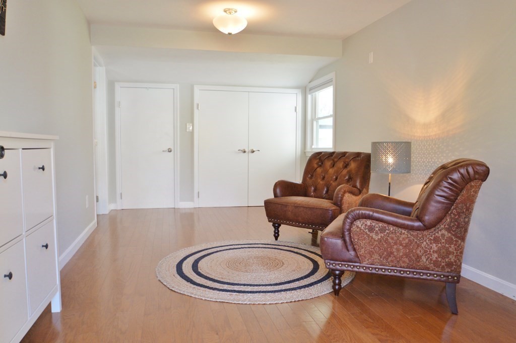 24 Raleigh Road Framingham, MA 01701 - Photo 17 of 37 a living room with furniture and a window