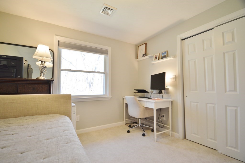 24 Raleigh Road Framingham, MA 01701 - Photo 27 of 37 a living room with furniture and a window