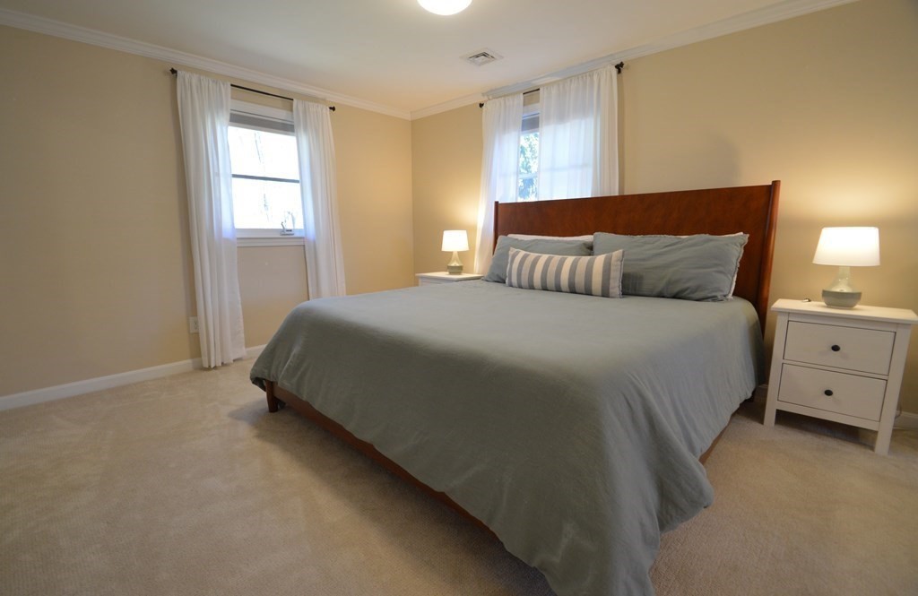 24 Raleigh Road Framingham, MA 01701 - Photo 28 of 37 a bedroom with a bed and window
