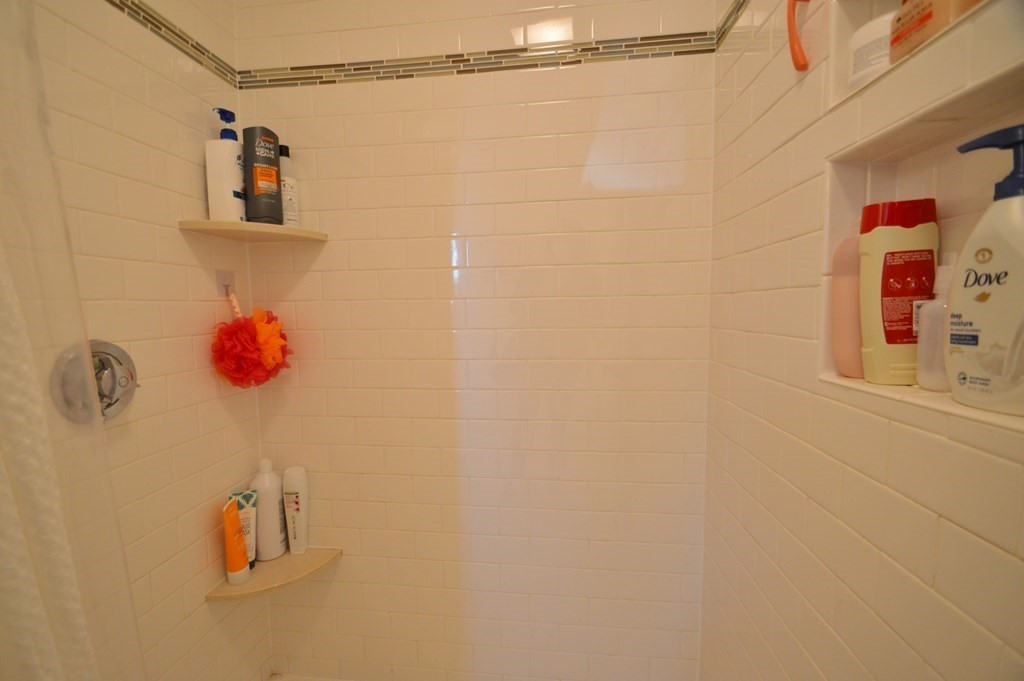 24 Raleigh Road Framingham, MA 01701 - Photo 34 of 37 a bathroom with a shower