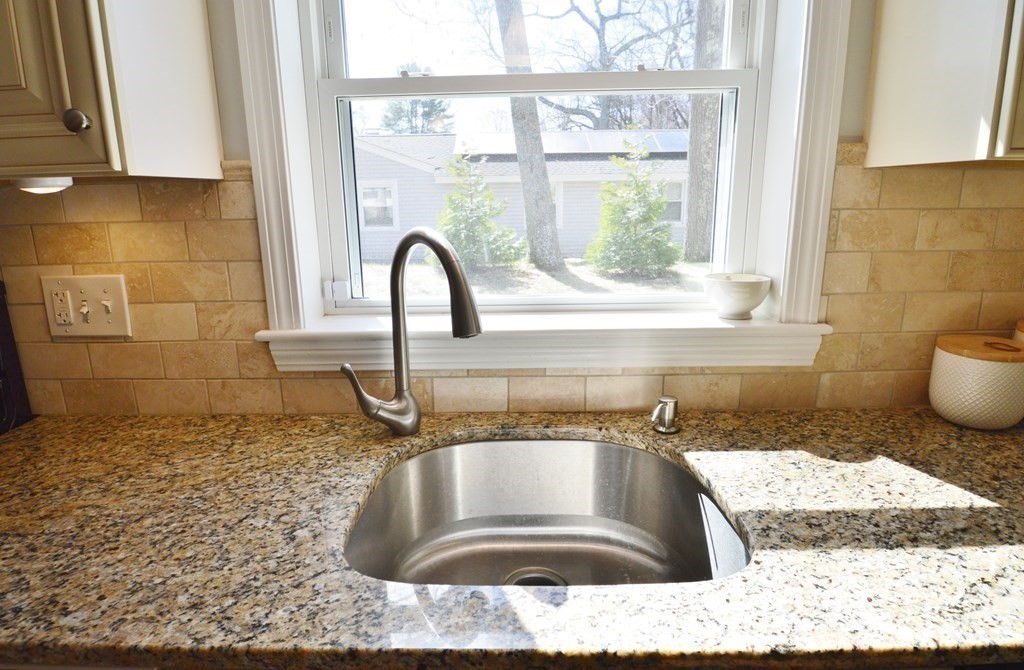 24 Raleigh Road Framingham, MA 01701 - Photo 5 of 37 a kitchen with a sink a counter space and a window
