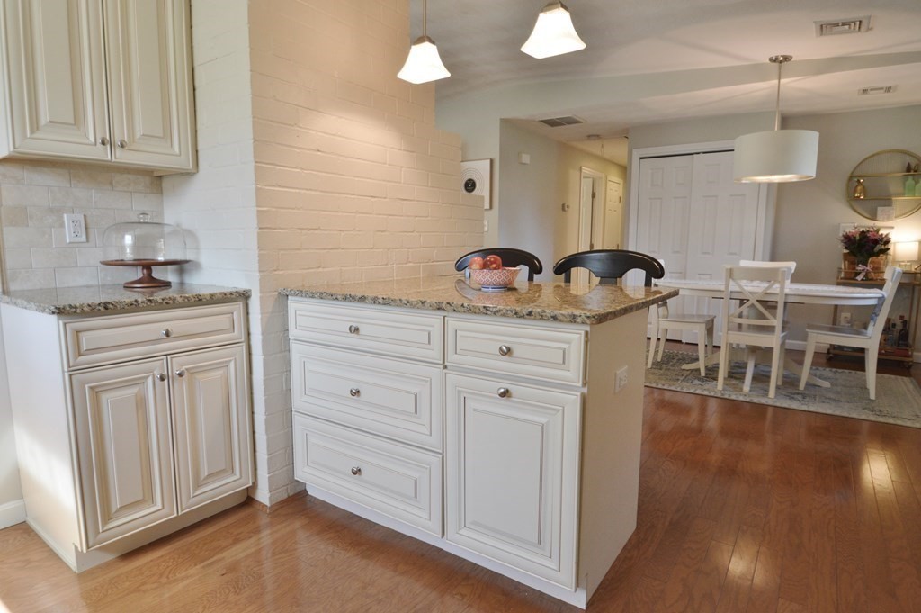 24 Raleigh Road Framingham, MA 01701 - Photo 8 of 37 a kitchen with a sink and cabinets