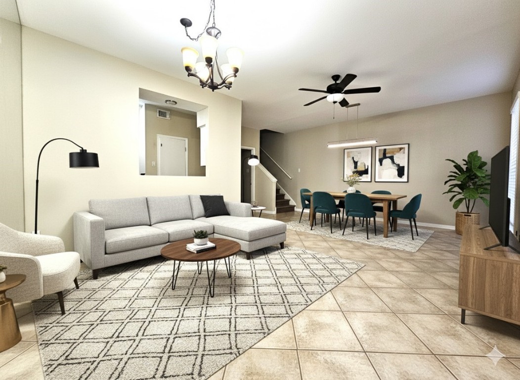 3800 Tanglewilde Street, Unit 605 Houston, TX 77063 - Photo 3 of 13 a living room with furniture flowerpot and a chandelier