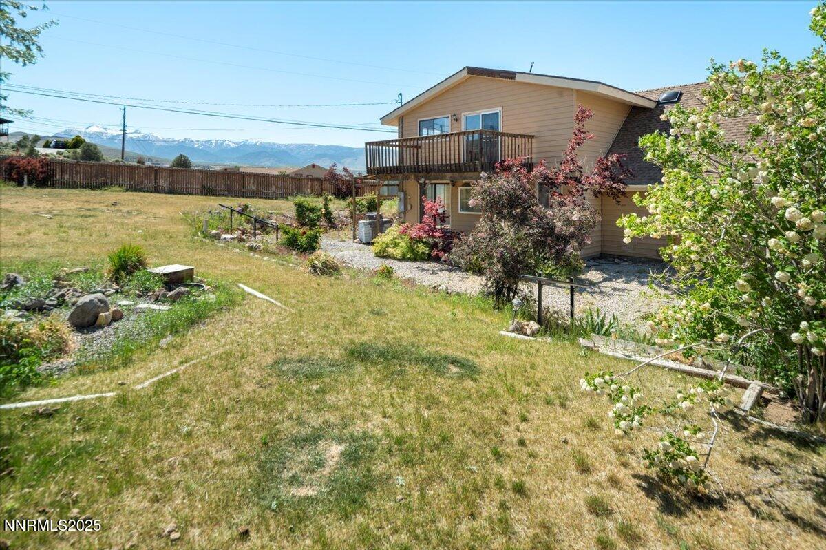 1190 Reese Way Reno, NV 89521 - Photo 4 of 25 a view of a house with a yard