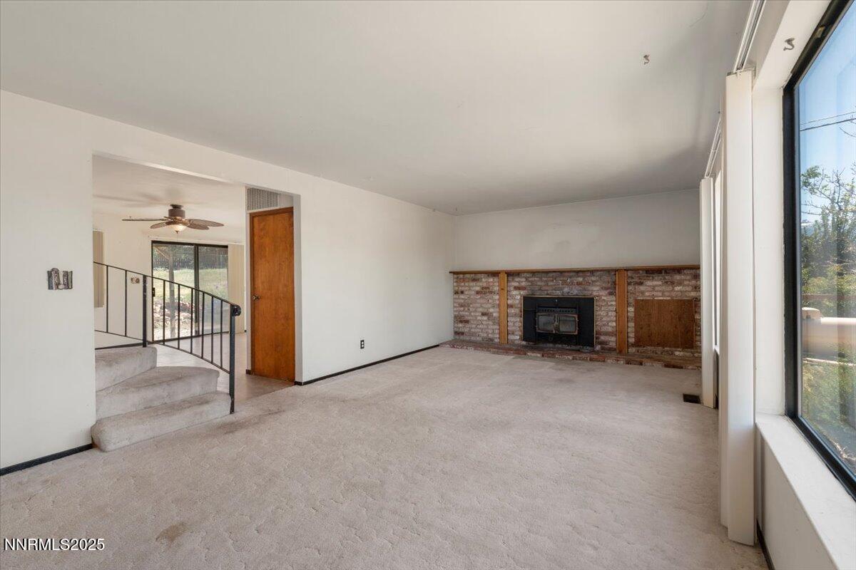 1190 Reese Way Reno, NV 89521 - Photo 5 of 25 a view of a livingroom with a fireplace