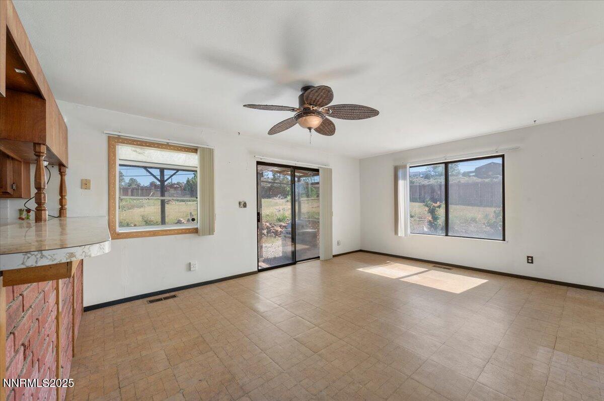 1190 Reese Way Reno, NV 89521 - Photo 10 of 25 wooden floor in an empty room with a window