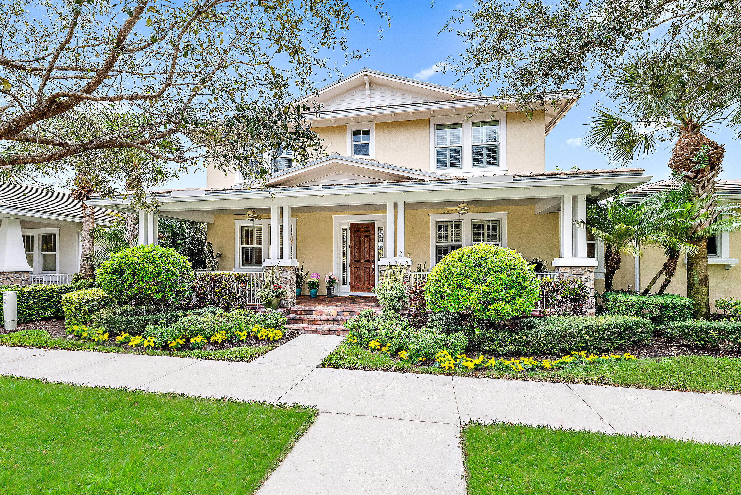 a front view of a house with a yard