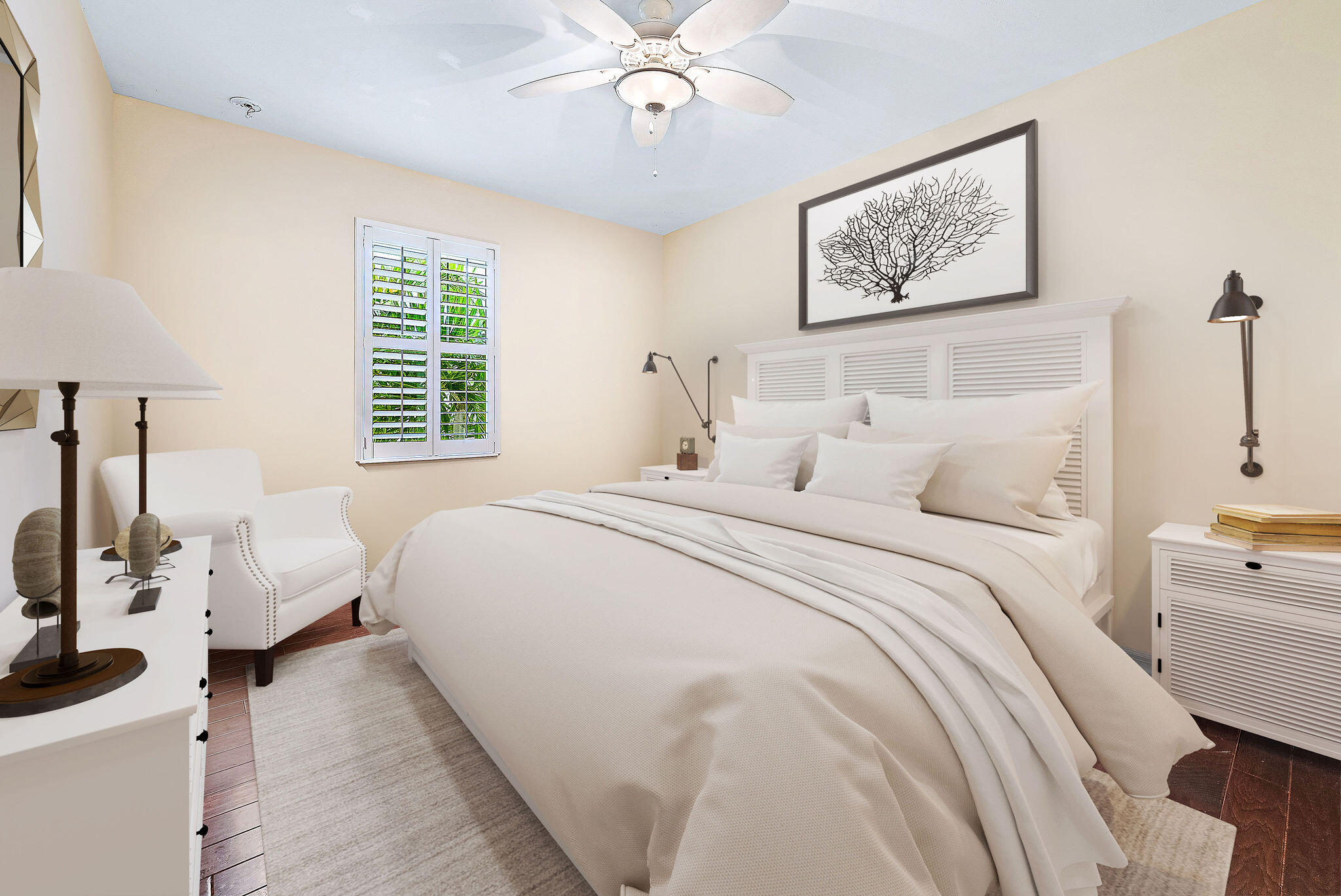 2702 West Mallory Boulevard Jupiter, FL 33458 - Photo 22 of 39 a bedroom with a bed a couch and a window