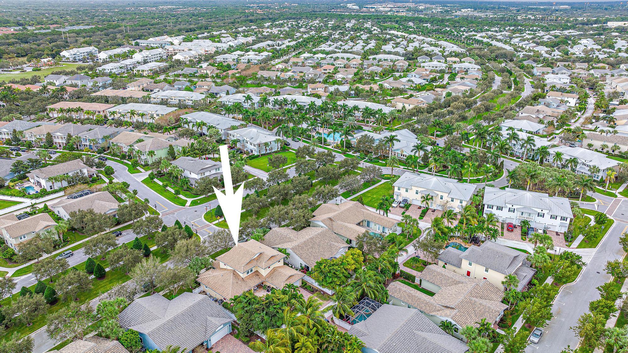 2702 West Mallory Boulevard Jupiter, FL 33458 - Photo 30 of 39 an aerial view of residential houses with outdoor space