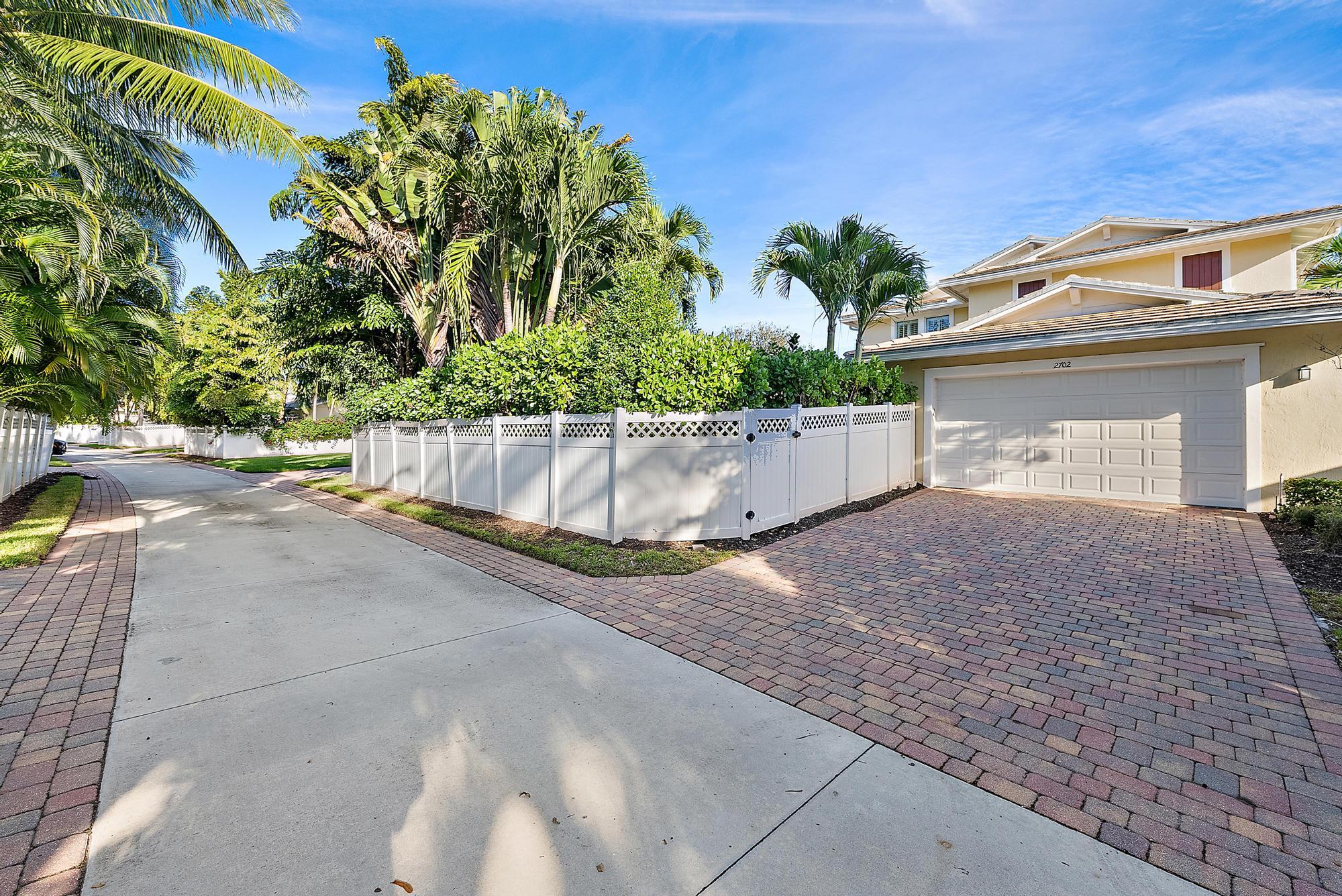 2702 West Mallory Boulevard Jupiter, FL 33458 - Photo 34 of 39 a view of outdoor space and yard
