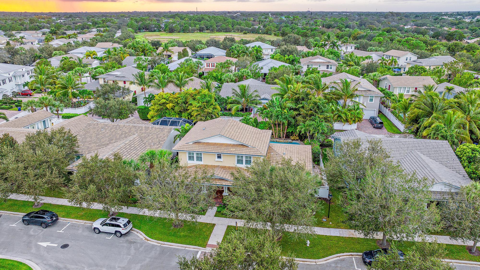 2702 West Mallory Boulevard Jupiter, FL 33458 - Photo 35 of 39 an aerial view of residential houses with outdoor space and street view