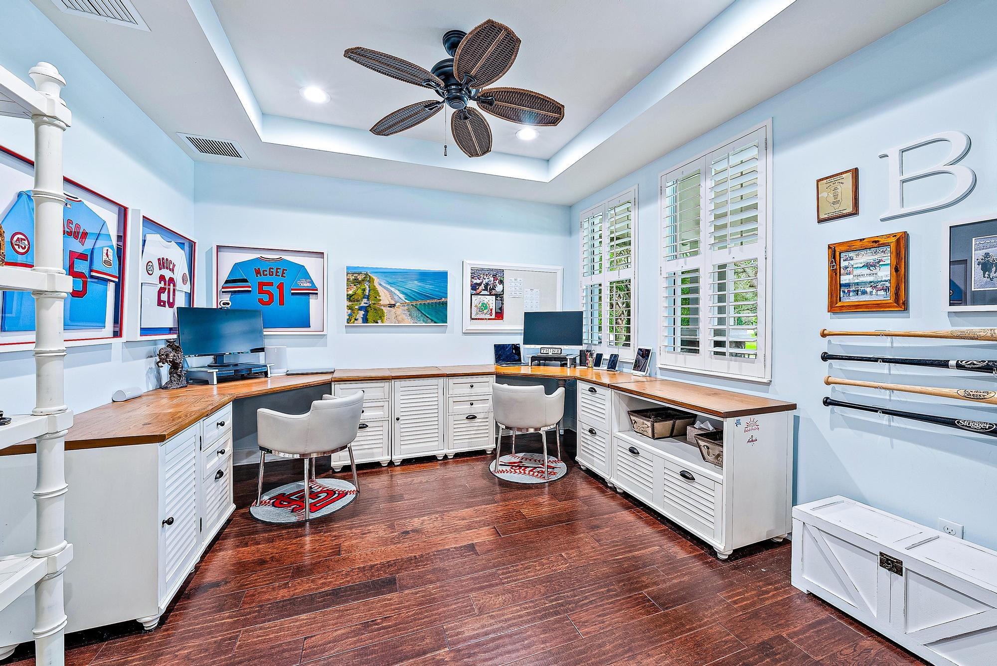 2702 West Mallory Boulevard Jupiter, FL 33458 - Photo 5 of 39 a view of a room with furniture and wooden floor