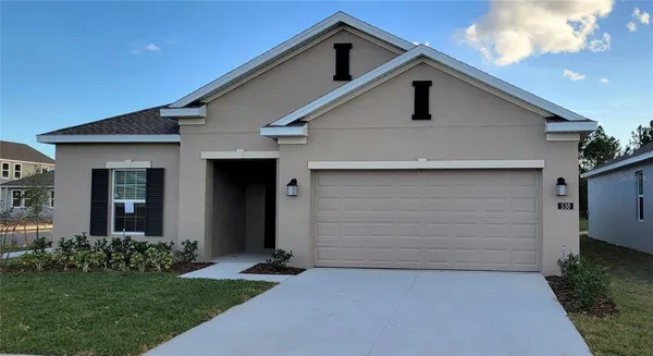 a front view of house with yard