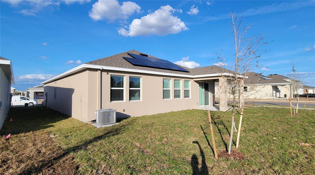 538 Hatteras Road Davenport, FL 33837 - Photo 18 of 29 a front view of a house with garden