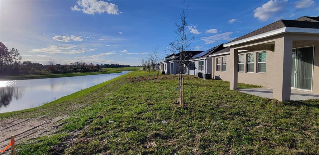 538 Hatteras Road Davenport, FL 33837 - Photo 19 of 29 a view of a house with a yard