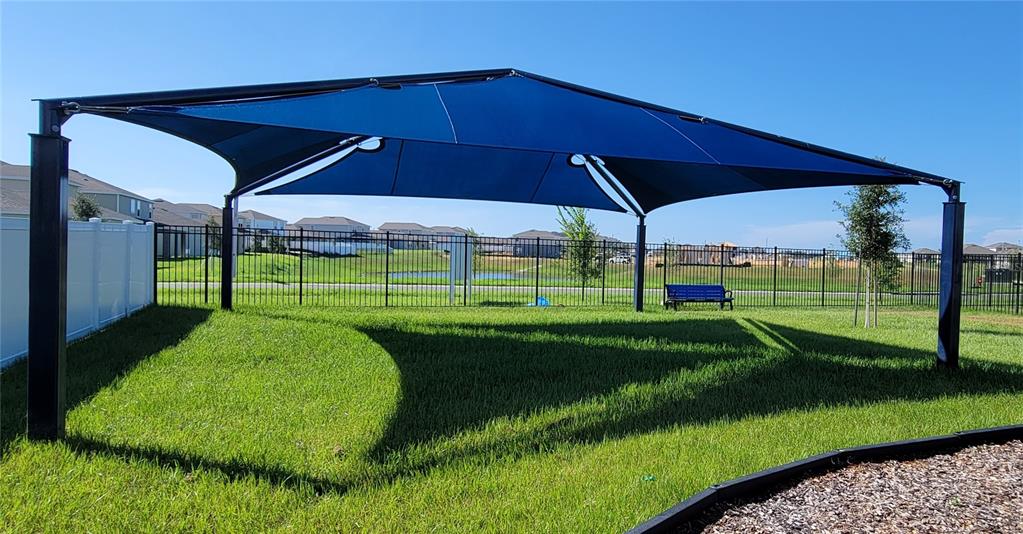 538 Hatteras Road Davenport, FL 33837 - Photo 29 of 29 a view of a house with a yard