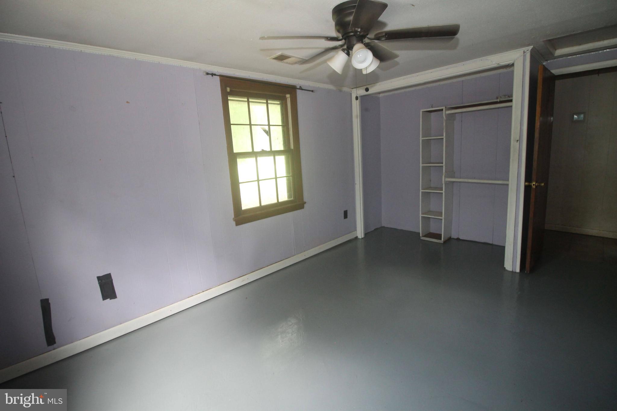 199 Keyser Run Road Washington, VA 22747 - Photo 18 of 30 an empty room with a window
