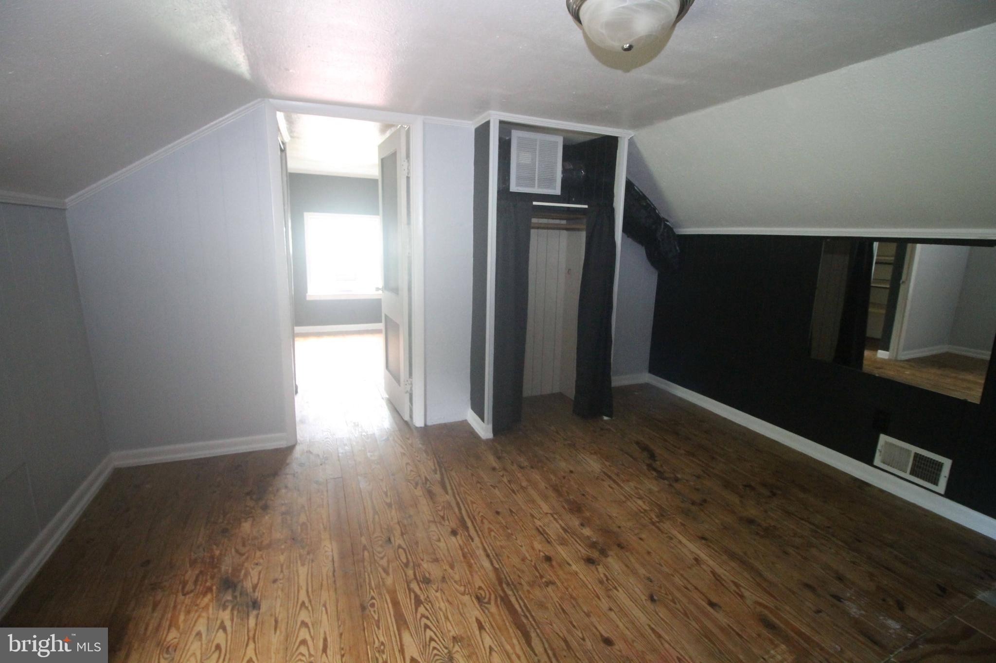 199 Keyser Run Road Washington, VA 22747 - Photo 24 of 30 a view of empty room with wooden floor