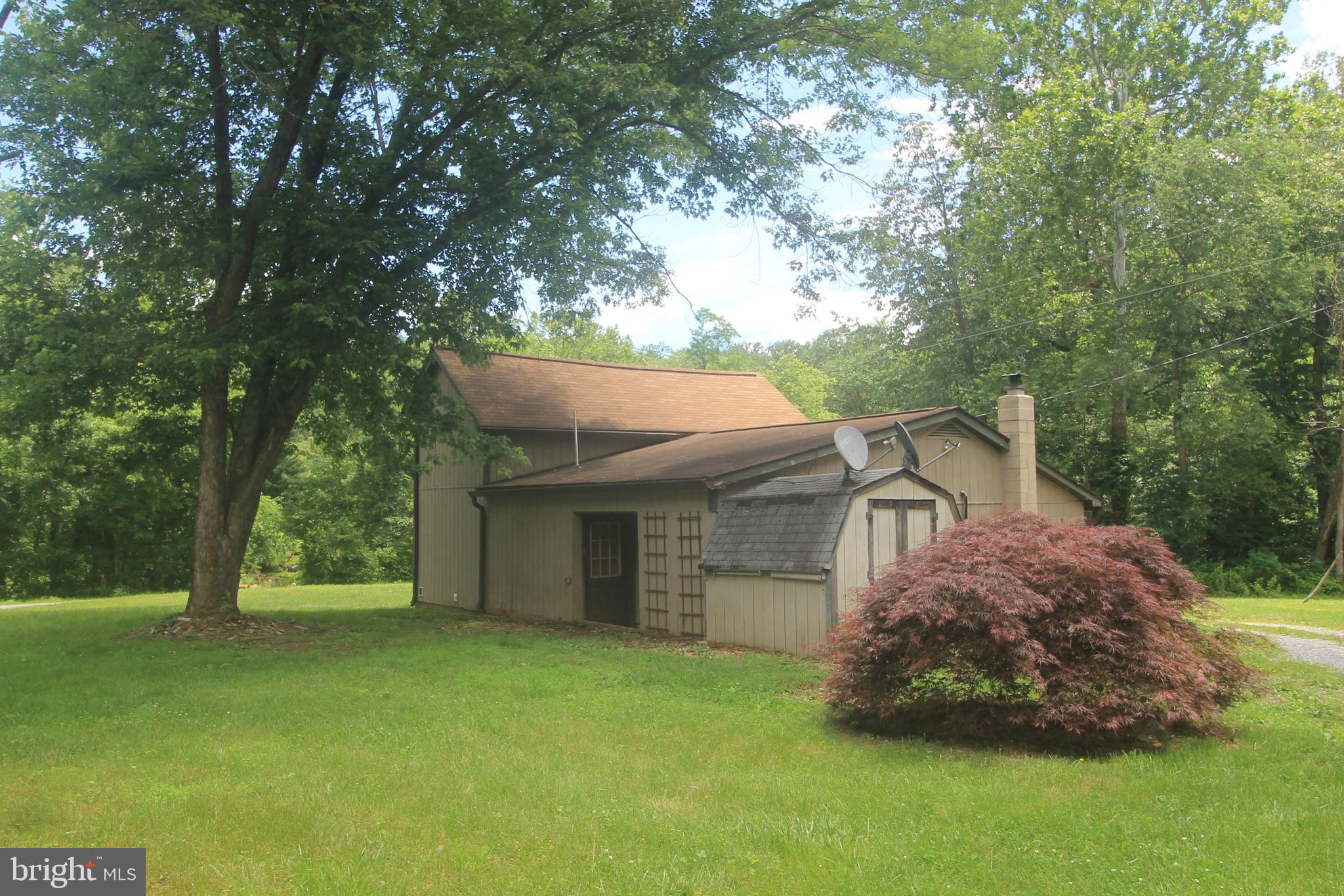 199 Keyser Run Road Washington, VA 22747 - Photo 7 of 30 a house that has a tree in front of it