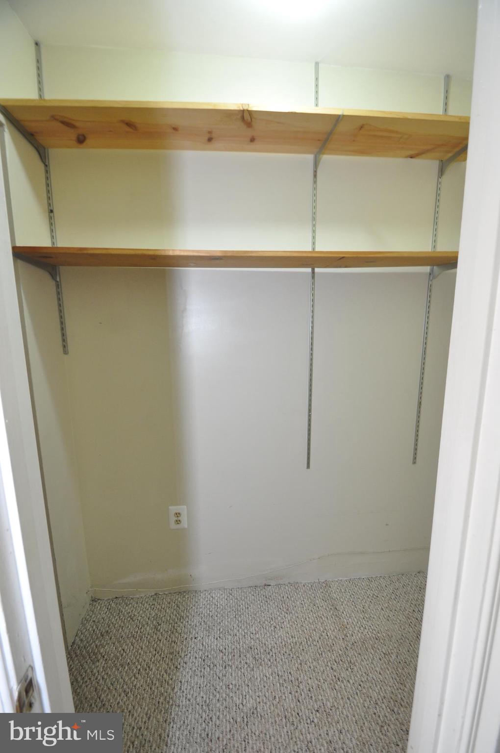 2704 Hunters Gate Terrace Silver Spring, MD 20904 - Photo 19 of 28 WALK IN CLOSET WITH ADDITIONAL ROOM TO THE LEFT.