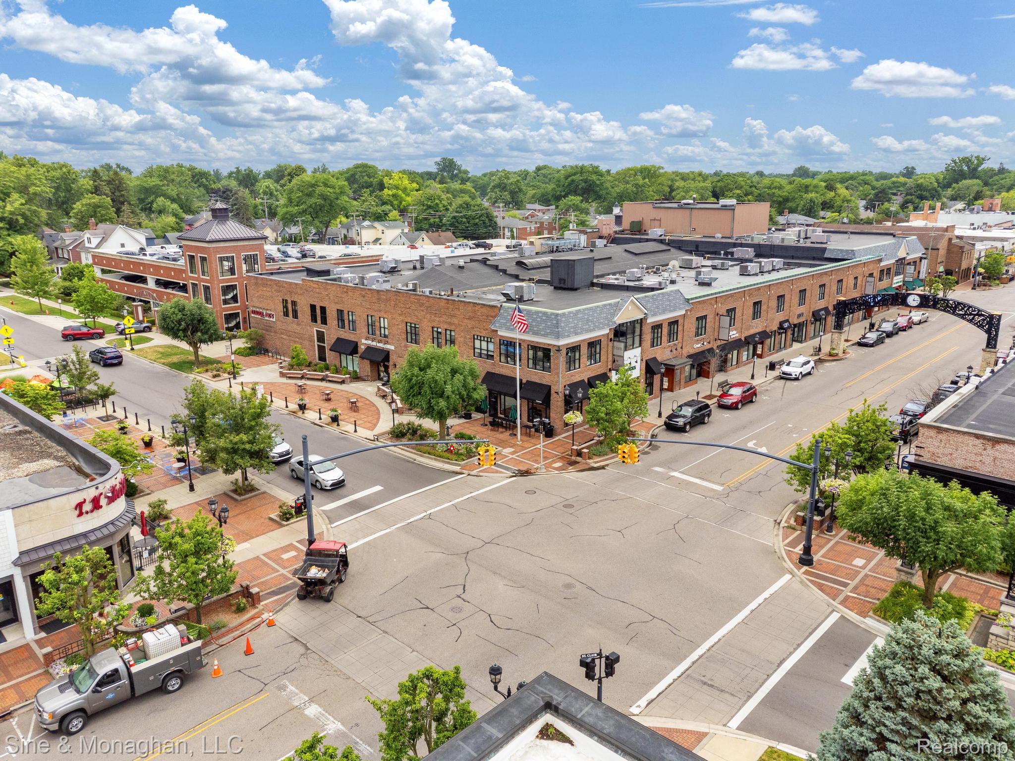 679 Neff Road Grosse Pointe, MI 48230 - Photo 60 of 78 Brick facade commercial buildings with multiple storefronts and a prominent corner location