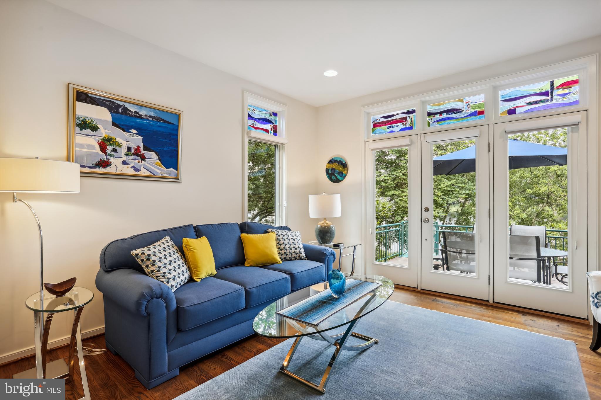 1480 Waterfront Road Reston, VA 20194 - Photo 21 of 65 a living room with furniture and a large window