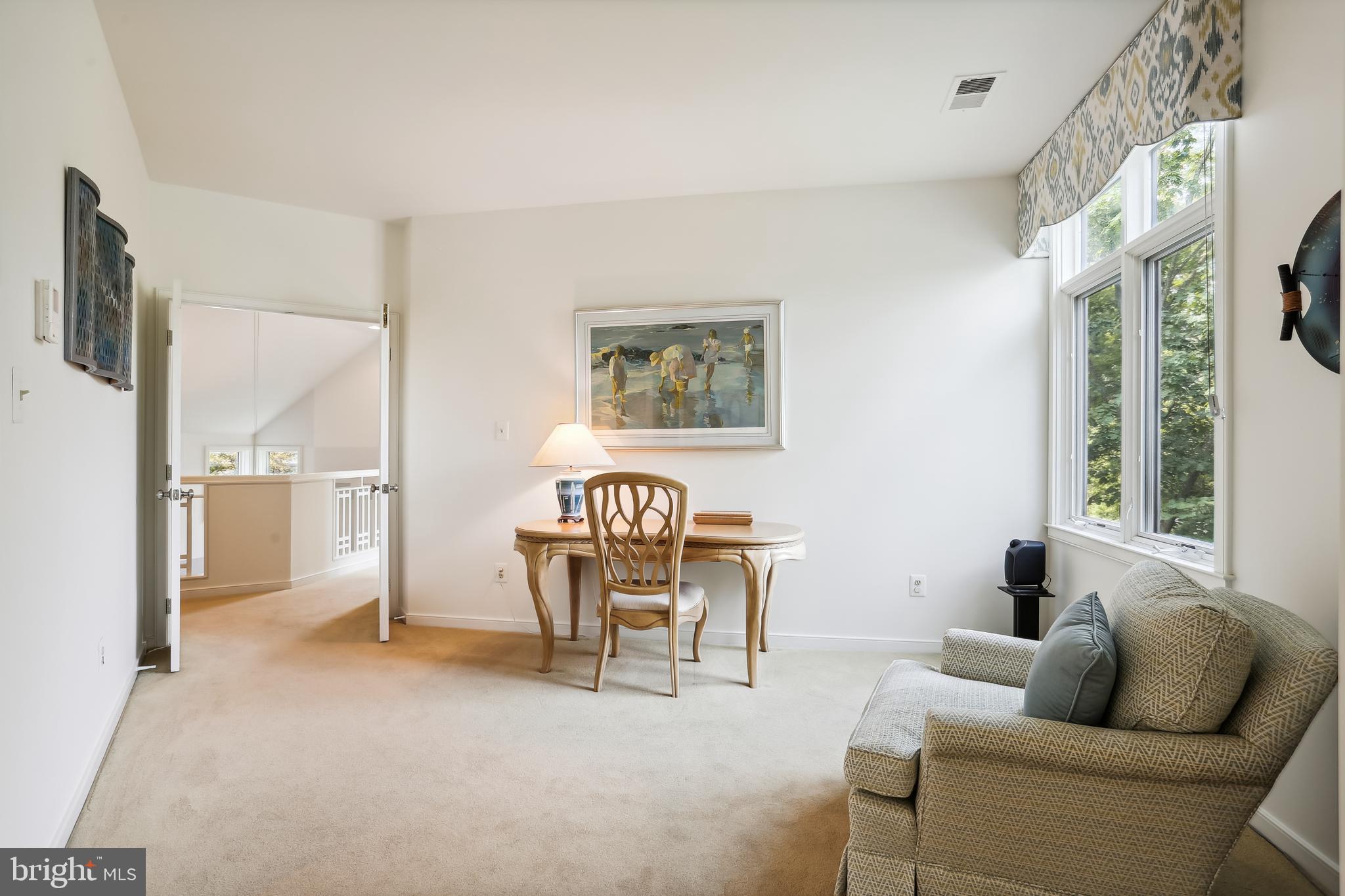 1480 Waterfront Road Reston, VA 20194 - Photo 34 of 65 a living room with furniture and a window