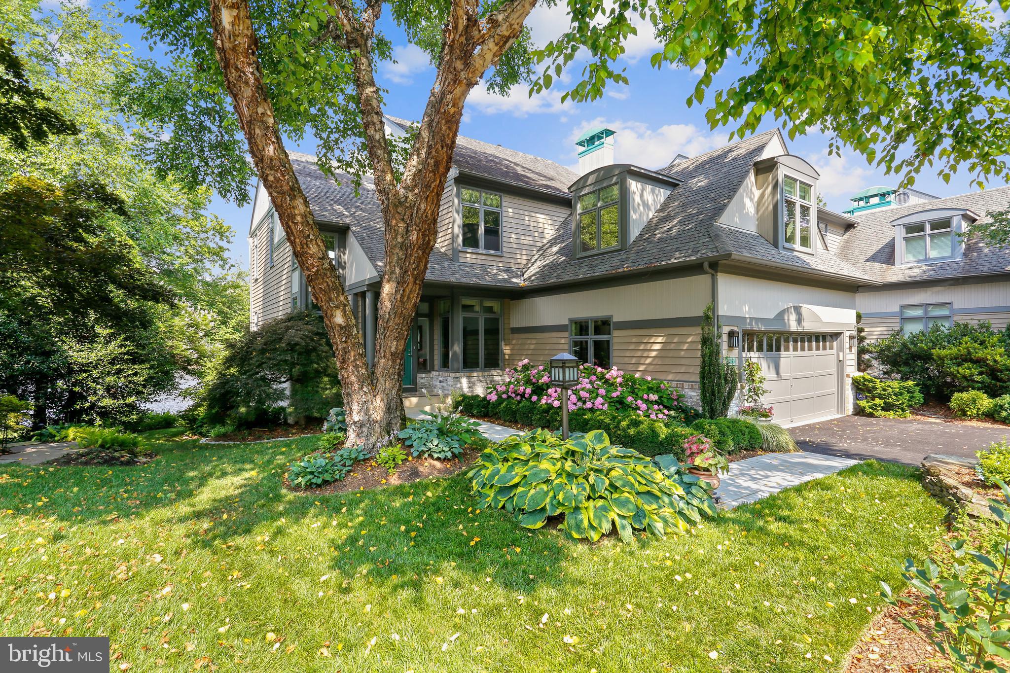 1480 Waterfront Road Reston, VA 20194 - Photo 5 of 65 a front view of a house with garden