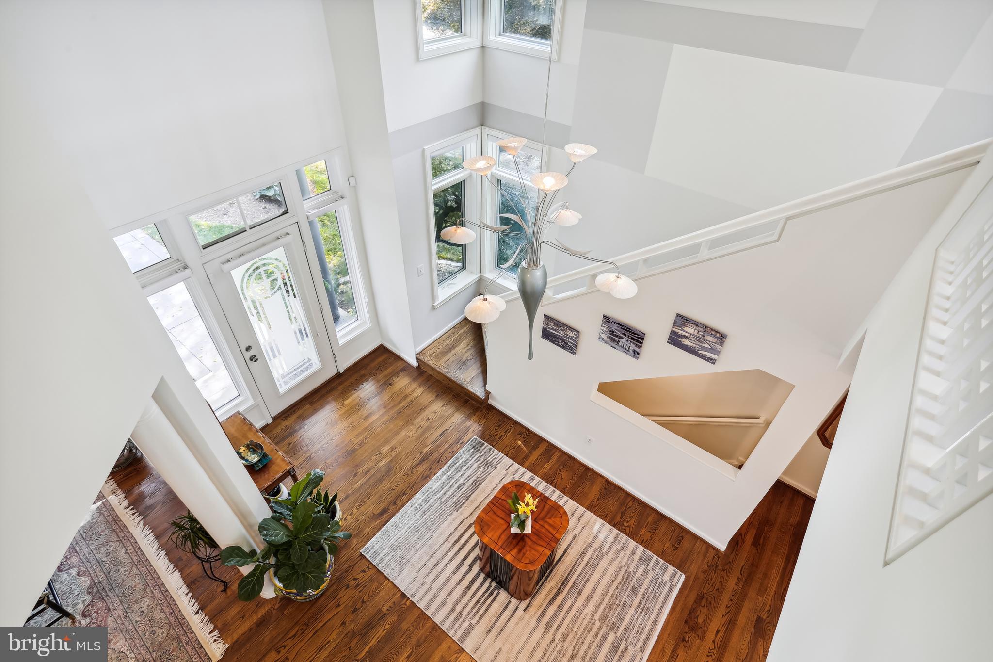 1480 Waterfront Road Reston, VA 20194 - Photo 8 of 65 a view of living room with furniture and wooden floor