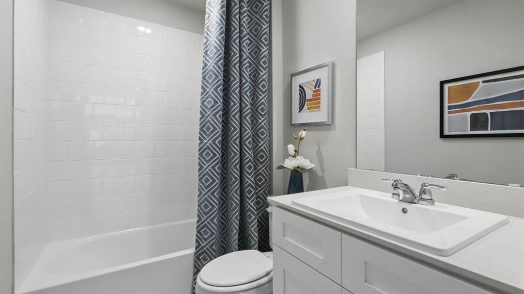 16449 Hudson Pr Way Justin, TX 76247 - Photo 28 of 35 a bathroom with a sink toilet and shower