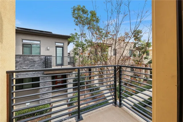 a spacious bathroom with a shower sink and mirror