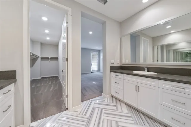 a view of a room with white walls