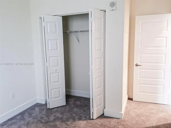 an empty room with closet