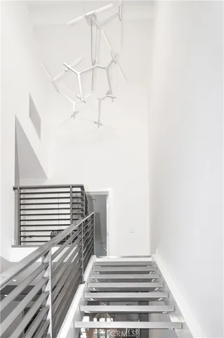 a bedroom with a bed and with a couch