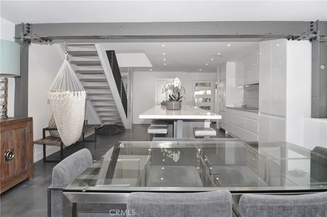 a view of kitchen with furniture and window