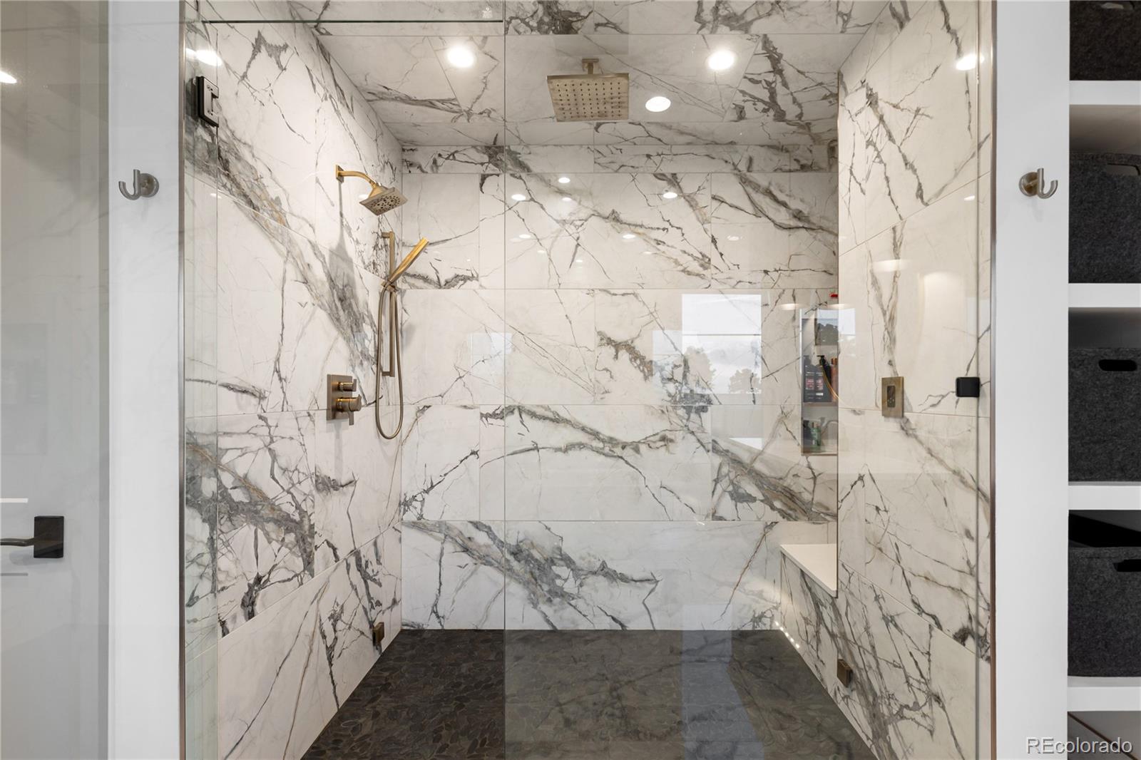 10689 Shadow Pines Road Parker, CO 80138 - Photo 27 of 50 a bathroom with shower