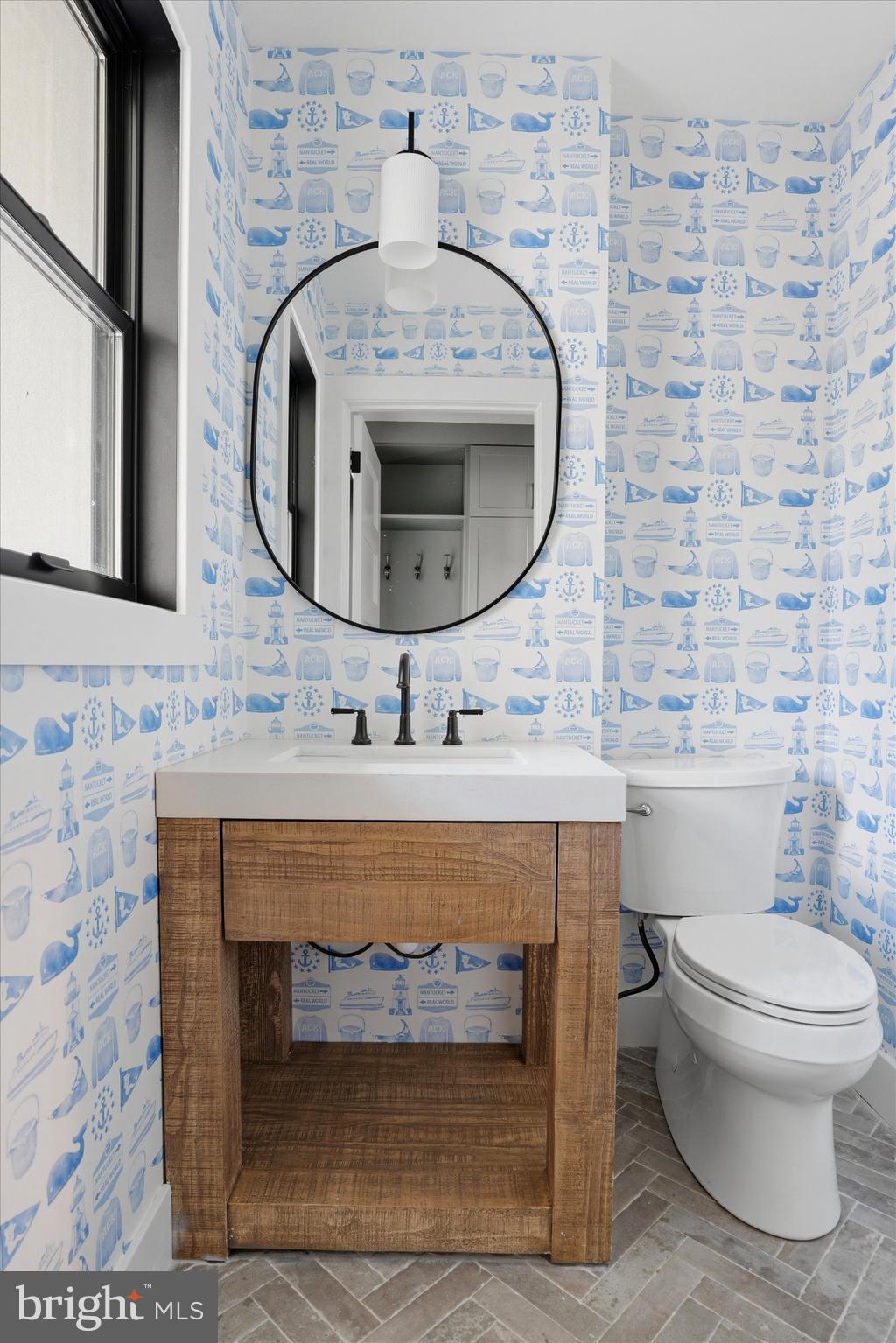 292 Church Road Devon, PA 19333 - Photo 20 of 49 a bathroom with a toilet a sink and mirror