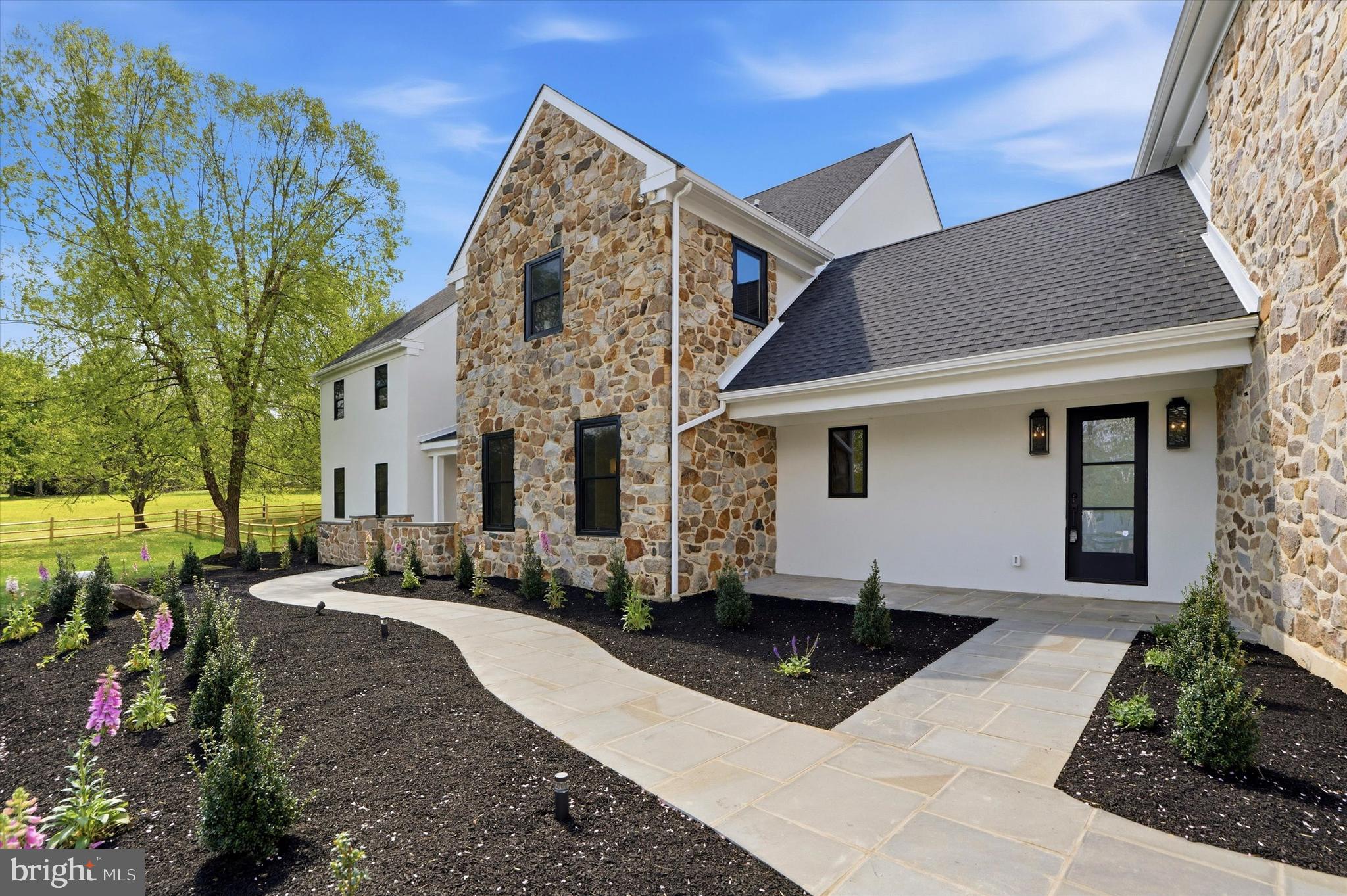 292 Church Road Devon, PA 19333 - Photo 3 of 49 a view of a house with a patio