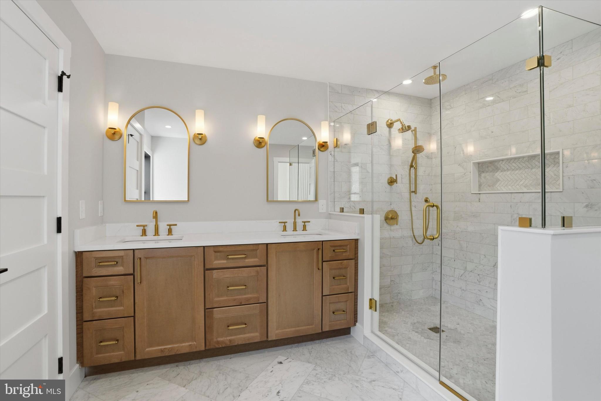 292 Church Road Devon, PA 19333 - Photo 37 of 49 a bathroom with a double vanity sink mirror and double