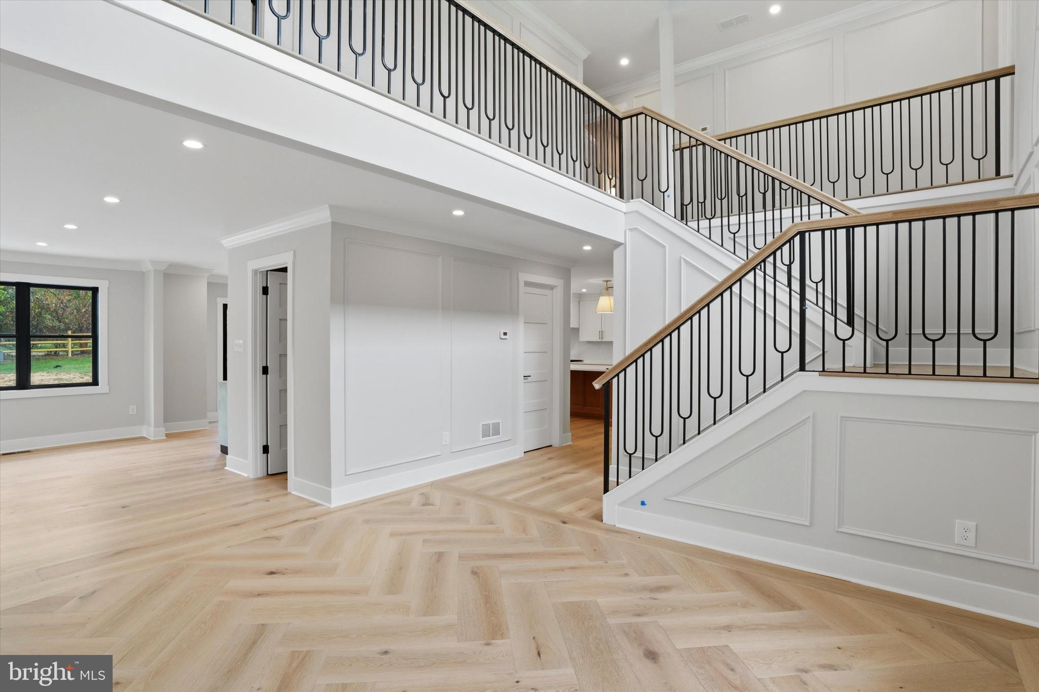 292 Church Road Devon, PA 19333 - Photo 4 of 49 a view of staircase with white walls and a window