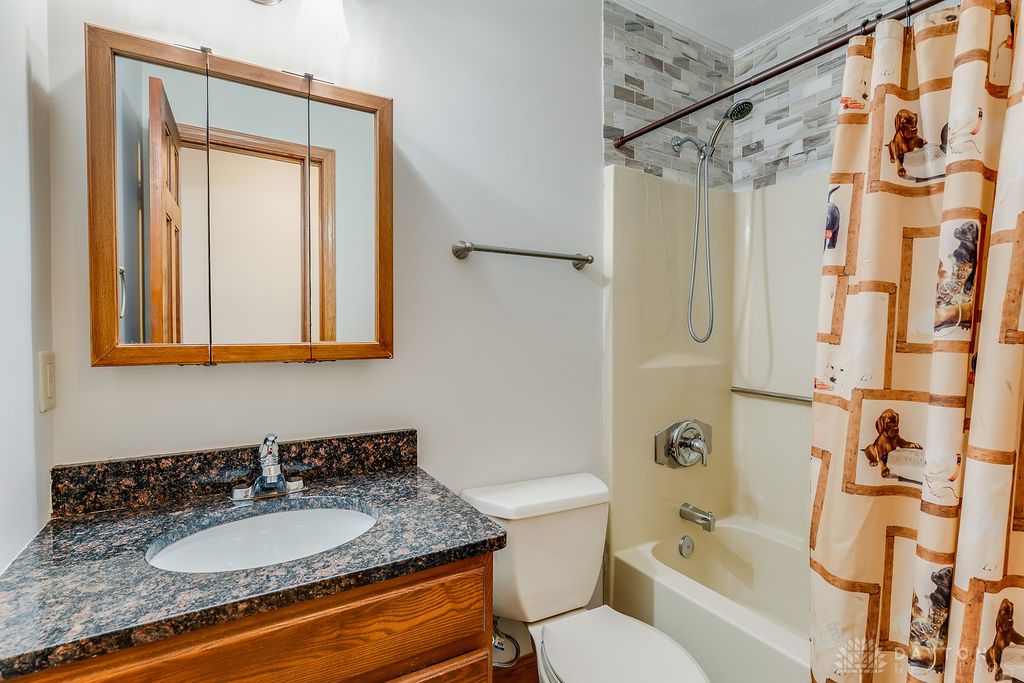 7400 Cook-Jones Road Waynesville, OH 45068 - Photo 22 of 72 This updated bathroom offers a comfortable and practical space for daily routines.