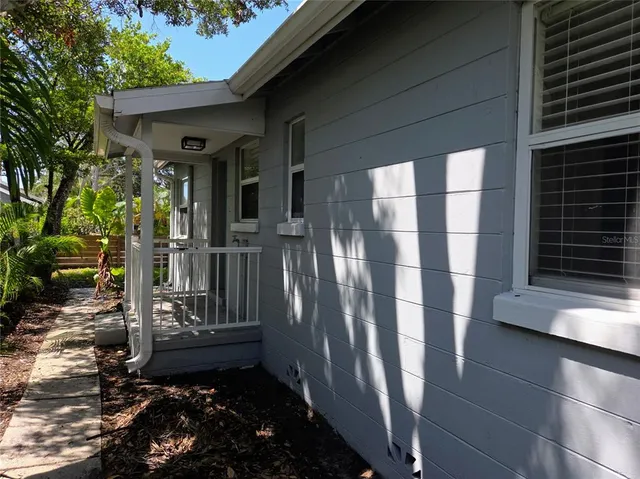a view of a back yard of the house