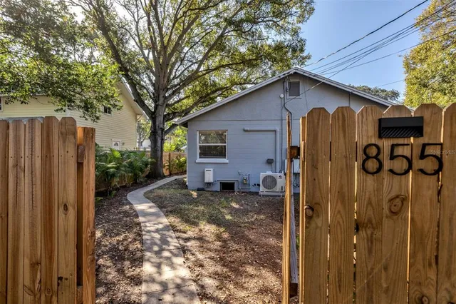 a backyard of a house with seating space