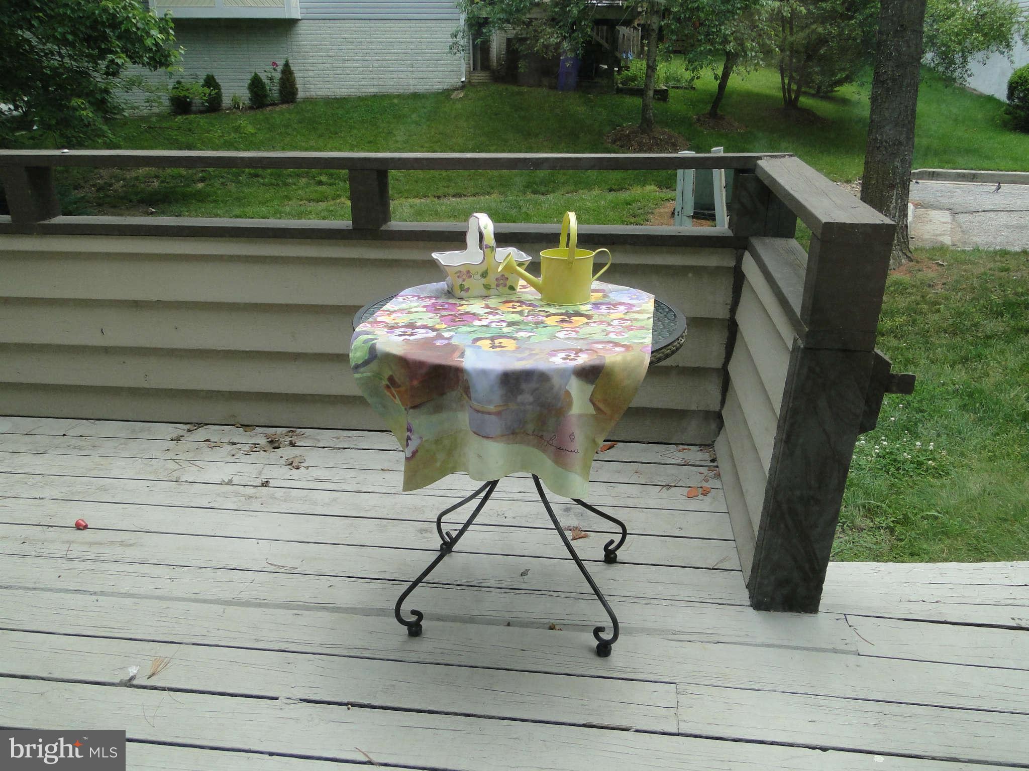 9422 Clocktower Lane Columbia, MD 21046 - Photo 10 of 28 Enjoy tea on the deck off the kitchen