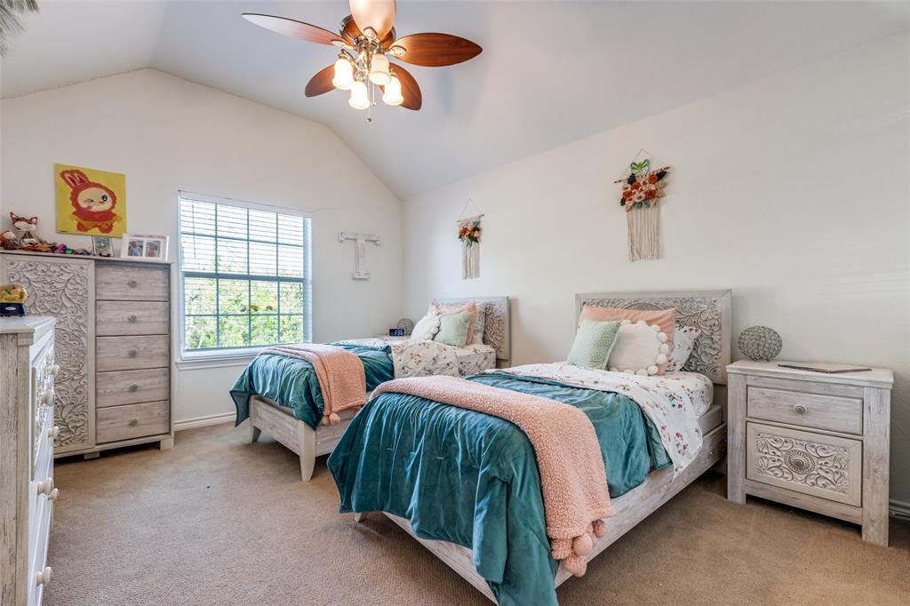 1110 Hart Road Fairview, TX 75069 - Photo 11 of 13 a bedroom with a bed and a dresser